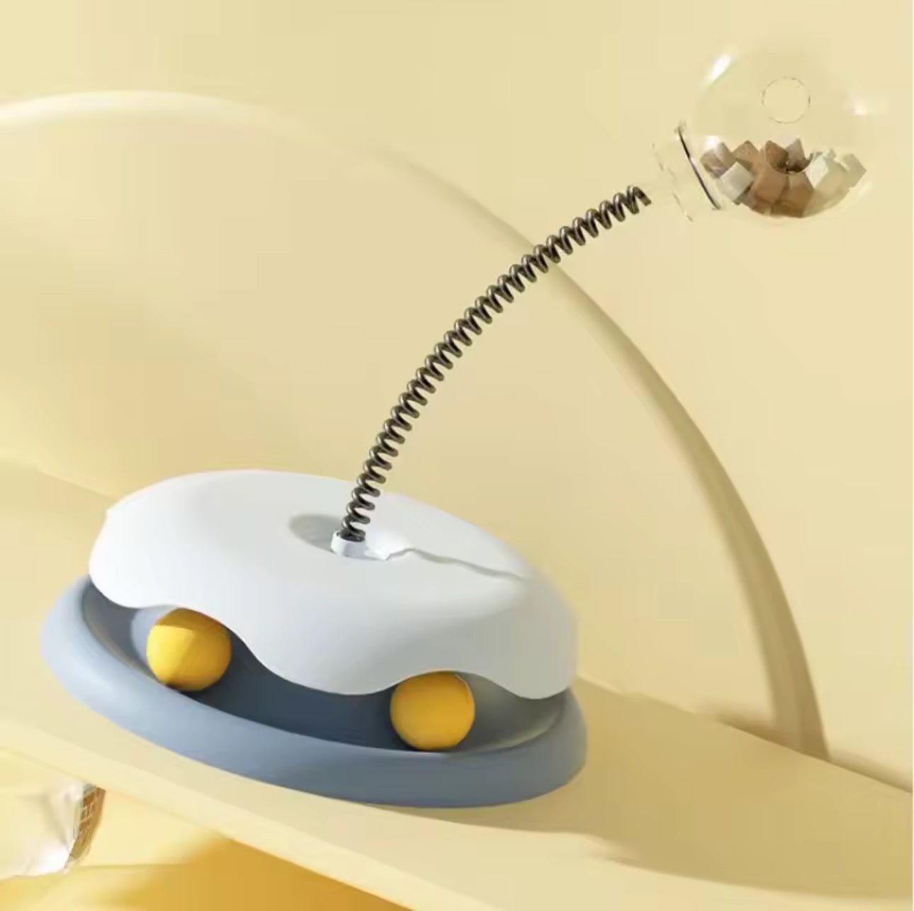 Jouet distributeur de croquettes pour chat